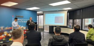 Moore Markhams presentation on doing business in New Zealand highlighting advisory services, national office locations and international connections through Moore Global