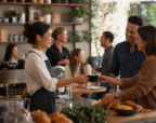 Modern New Zealand café with customers enjoying coffee and conversation while café staff provide professional service in a welcoming hospitality environment.